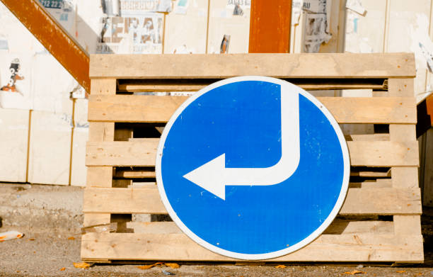 istock Road traffic sign. Detour on the left 1326271114