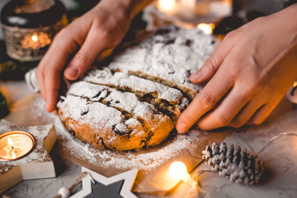 istock Traditional german stollen cake with Christmas decorations. 1326271856