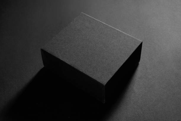 Empty black box on black background stock photo