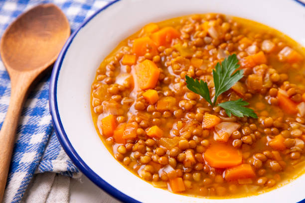 istock Lentils with carrots. Traditional northern spanish tapa. 1326272972