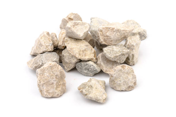 istock Gray small rocks ground texture isolated on white background. Small road stone. 1326276006