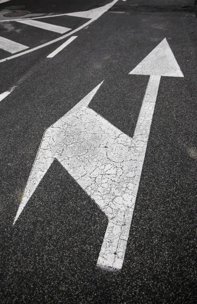 istock Arrow sign on the asphalt 1326276279