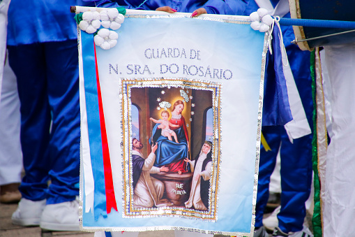 Oliveira, Minas Gerais, Brazil - August 8, 2018: congado - banner detail with image of Our Lady of the Rosary during procession