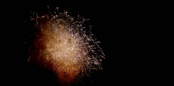 istock Colorful fireworks of various colors over night sky, Real Fireworks on Deep Black Background Sky on Fireworks festival show before independence day on 4 of July. Beautiful fireworks show 1326282777