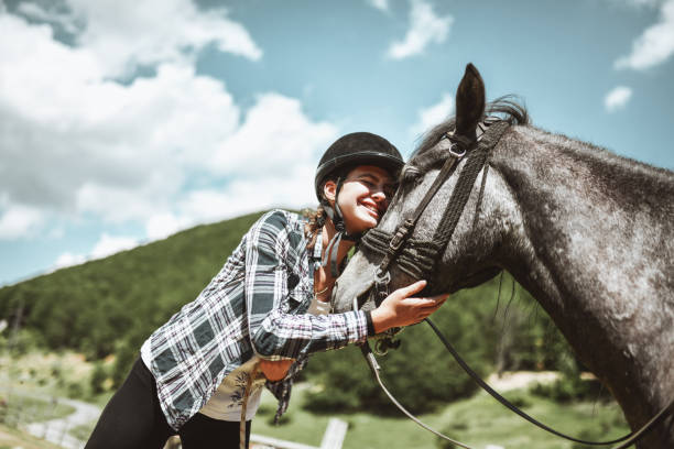 istock Female Spending Time With Favorite Horse On Mountain Ranch 1326284196