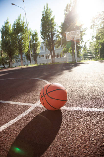 istock Basketball ball on the outdoors court 1326286830