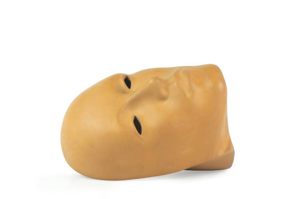 istock Old sculpture. Face lying down isolated on white background with clipping path. 1326287709