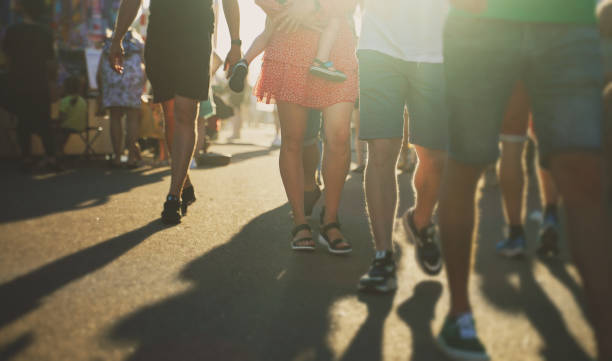 istock People walk down the street in summer. Blurred shot. 1326288905
