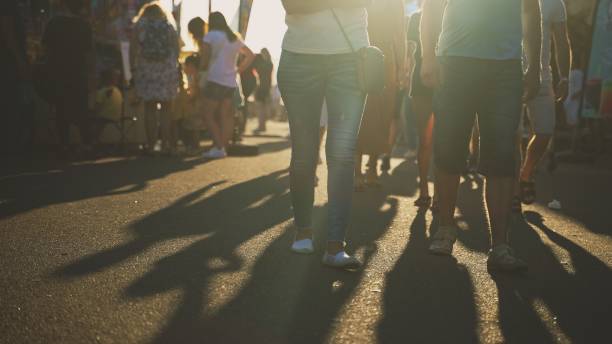 istock People walk down the street in summer. Blurred shot. 1326288917