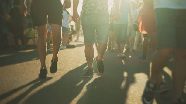 istock People walk down the street in summer. Blurred shot. 1326288930