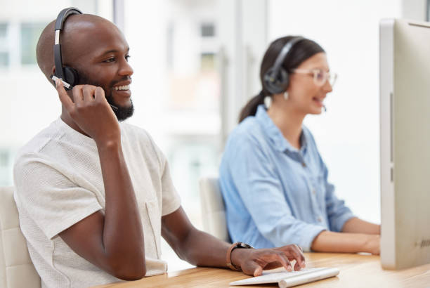 istock Shot of two call center workers together 1326289299