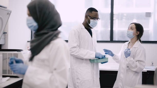 istock Shot of a group of scientists having a conversation in their work lab 1326292722
