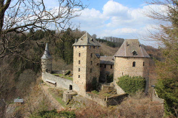 Malmedy, Belgium, 14 April 2021: Exterior view of Reinhardstein Castle near Malmedy in the Belgian Ardennes. As the highest castle in Belgium it is a popular tourist attraction. Copyspace top right.