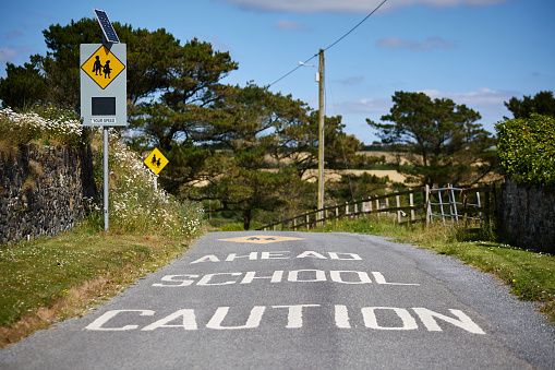 School zone warning sign on traffic