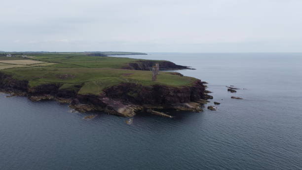 istock aerial flat of large cliffs in Brownstown Head - Ireland 1326293939