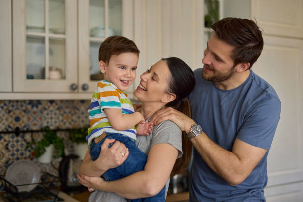 istock Parents spending quality time with their adorable son at home 1326294698
