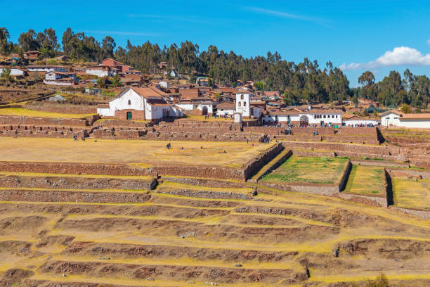 Chinchero Town Inca Ruin, Cusco, Peru Chinchero town with church tower built on Inca ruin with agriculture terraces, Sacred Valley of the Inca, Cusco province, Peru. chinchero district stock pictures, royalty-free photos & images