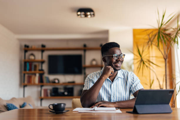 istock Adult African man, ordering take out. 1326299340