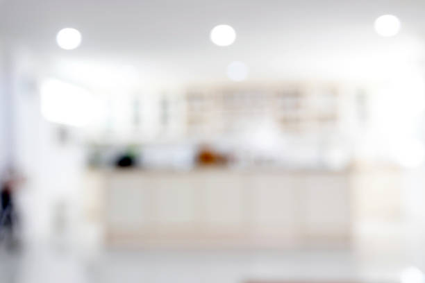 Blurred image for background of kitchen with wooden and white details, minimalistic interior design. stock photo