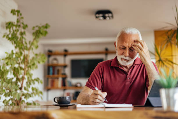 istock Senior man, working on his letter. 1326300548