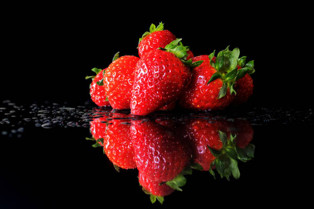 istock batch of strawberries with water drops 1326301686