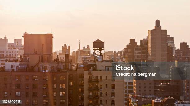 Drone Shot Of East Side Of Manhattan At Sunset Stock Photo - Download Image Now - East Village, Manhattan - New York City, Urban Skyline