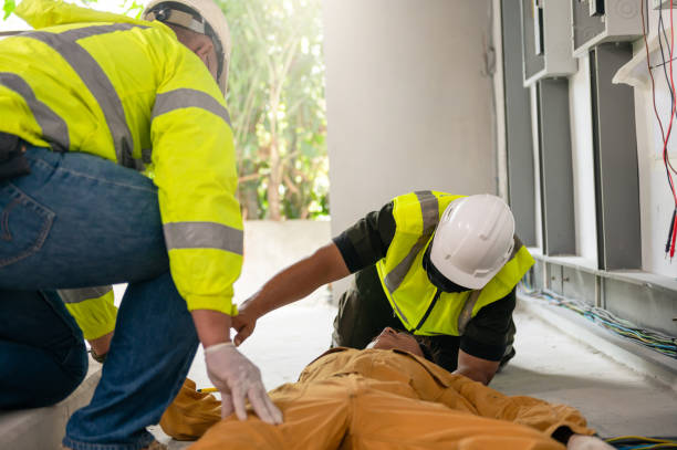 istock Safety team professional help technician accident electric shock unconscious in site work. Danger workplace. 1326304239