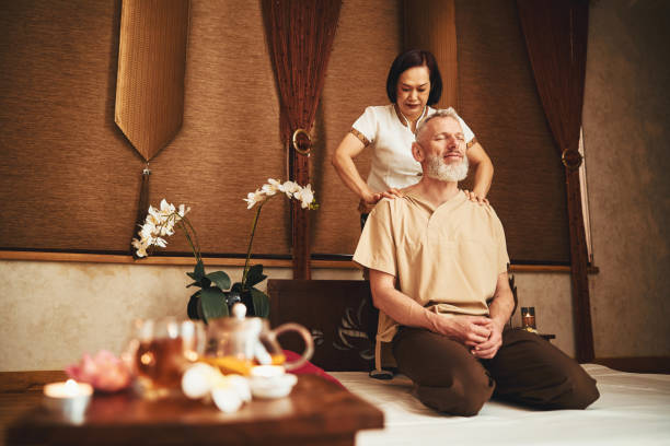 istock Happy grizzled guy in oriental massage studio 1326305129