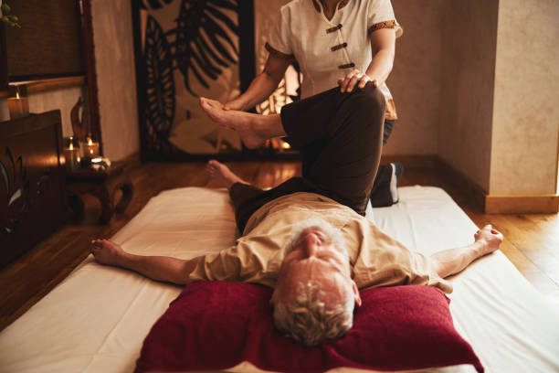 istock Grizzled man relaxing during asian manual therapy 1326305177