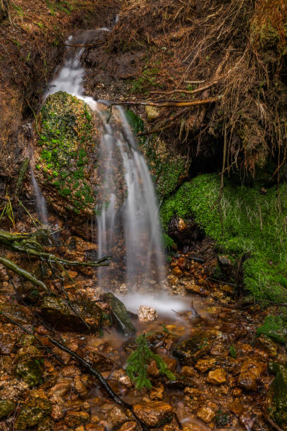 istock Small waterfall near Lisci valley in spring color day 1326306555