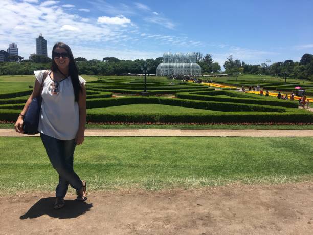 Image of a woman enjoying in the Botanical Garden of Curitiba