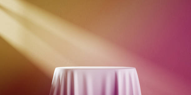 istock 3d render, abstract monochrome pink yellow background with sunlight rays. Modern minimal showcase scene with empty platform for product presentation. Table with white cloth 1326312932