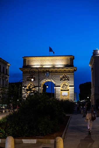 Triumphal arch of Montpellier illuminated in the night