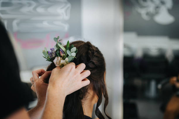 Bride prepares for her wedding in hair salon