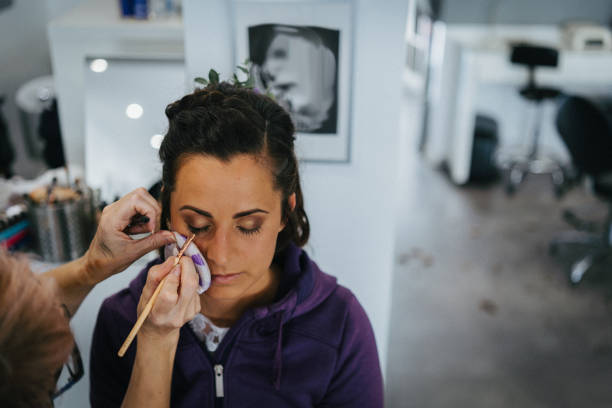 Bride prepares for her wedding in hair salon