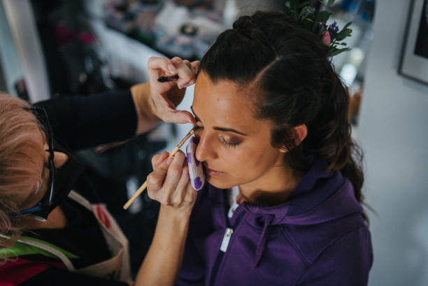 Bride prepares for her wedding in hair salon