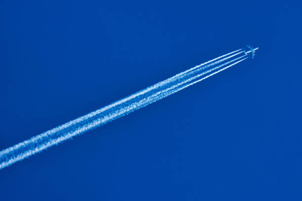 istock A jet flying high in the blue sky. 1326322588