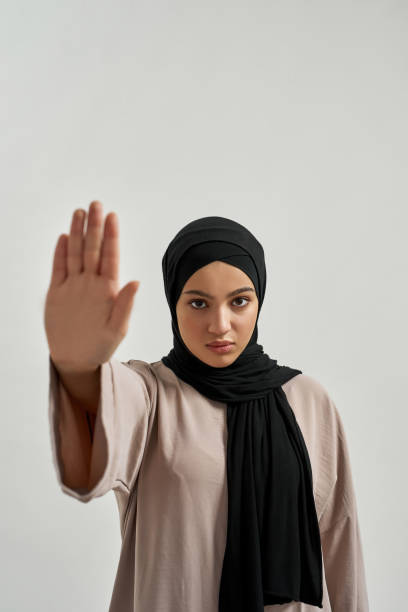 istock Attractive young arabian woman showing stop gesture 1326323036