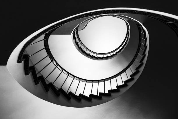 istock Staircases with grey metal handrails forming beautiful pattern 1326325445