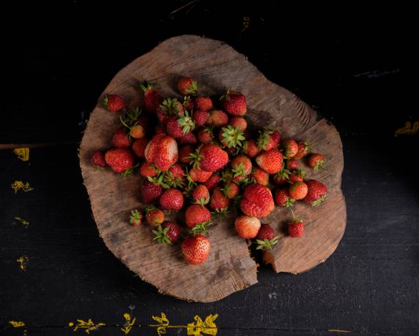 Strawberry on Wooden texture for background. Summer stock photo