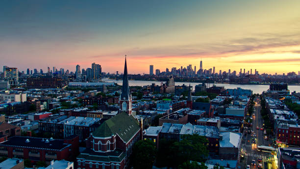 NYC Aerial Cityscape from Over Greenpoint, Brooklyn at Dusk Drone shot of New York City at sunset, taken from over Greenpoint in Brooklyn. Greenpoint, Brooklyn stock pictures, royalty-free photos & images