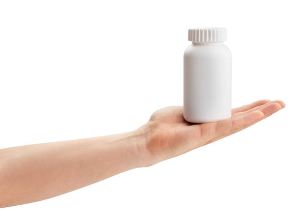istock medicine bottle in hand 1326327763