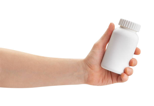 istock medicine bottle in hand 1326327773