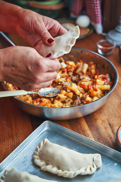 Preparing Argentinean Empanadas with Meat and Vegetables