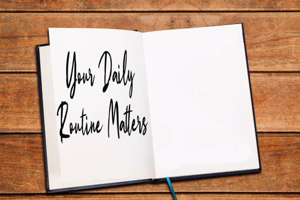 istock Your Daily Routine Matters concept for practice of regularly on agenda or notebook on wood table 1326330778