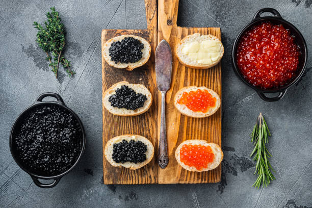 istock Sandwiches with red and black caviar    , on gray background, top view flat lay 1326332206