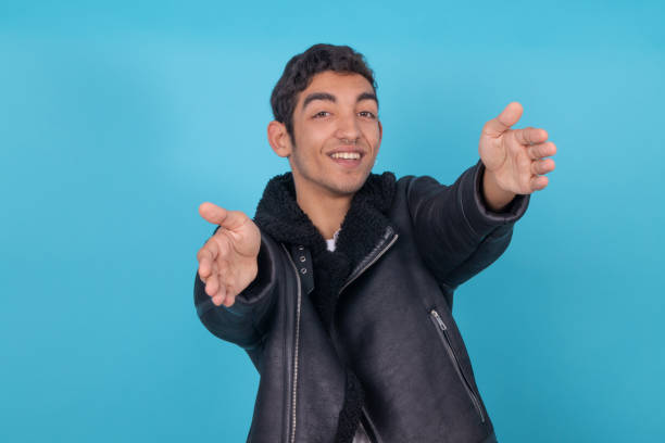 istock young expressive male model isolated on color background 1326333072