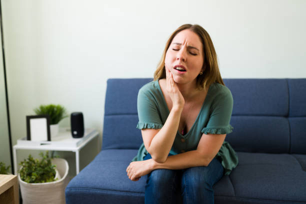 istock Woman with a painful expression and toot ache 1326337445