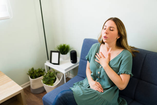 istock Stressed woman catching her breath 1326337595