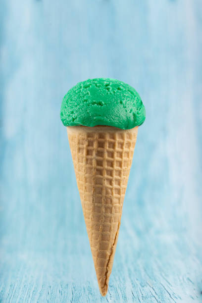 istock Tasty pistachio ice cream cone. 1326341590